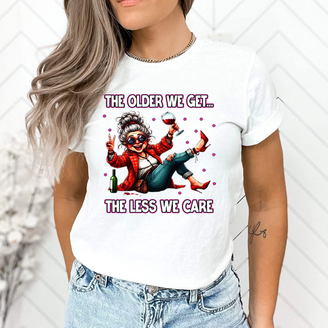 The Older We Get.. The Less We Care  - Unisex T-Shirt