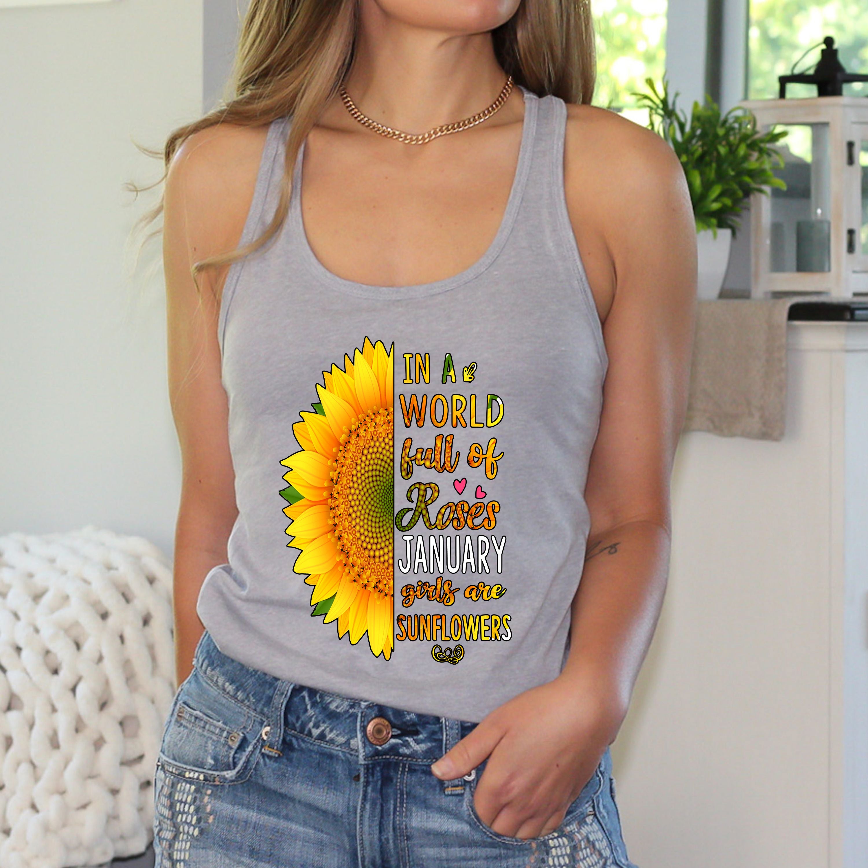 "In a world full of roses January girls are Sunflowers"