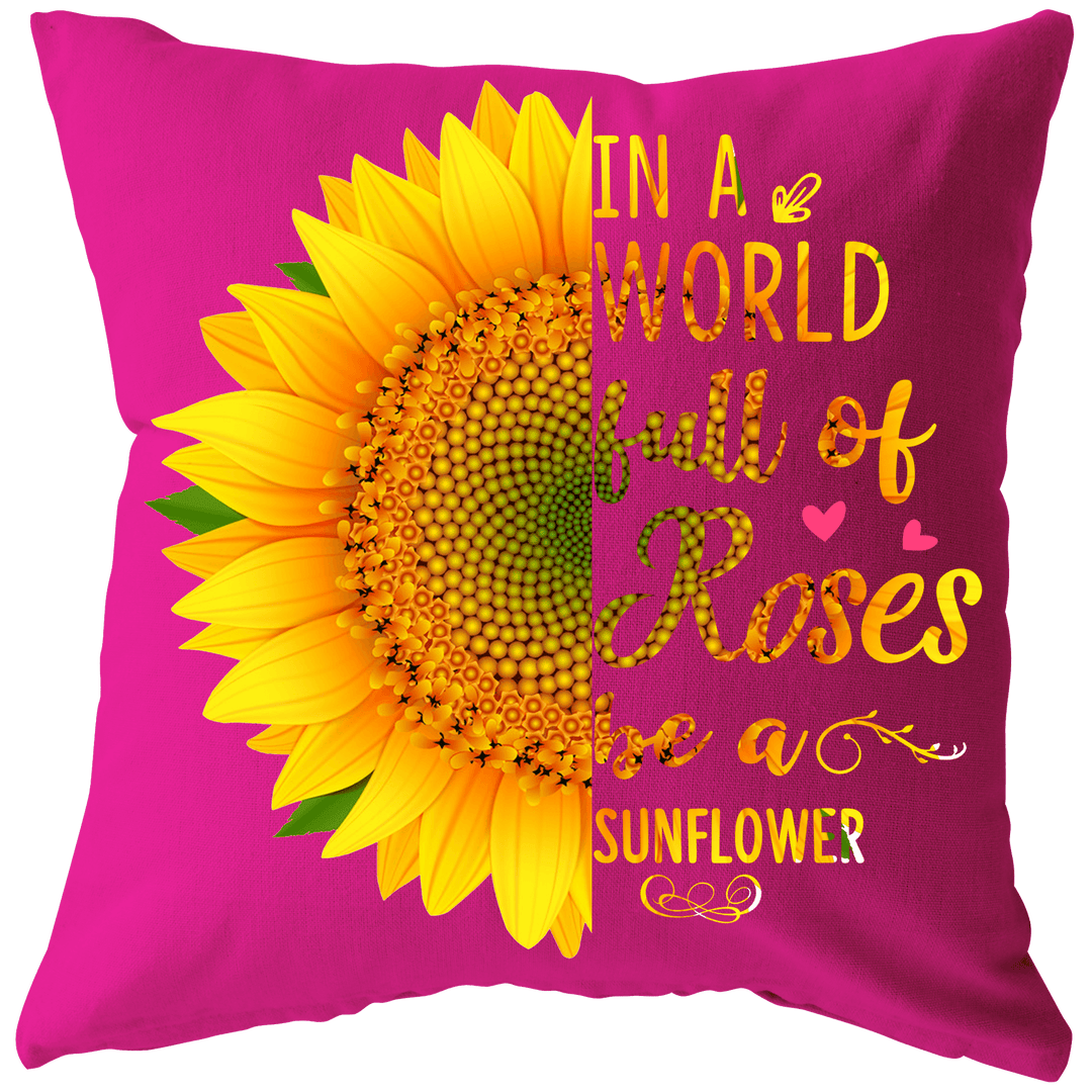 "IN A WORLD FULL OF ROSES BE A SUNFLOWER Cushion" -Pink